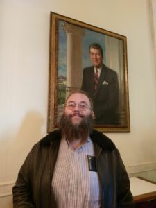 Matt Adams pictured beneath Ronald Reagan's White House portrait. 