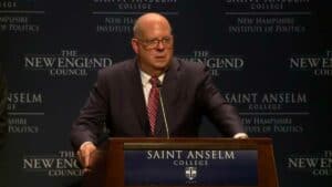 This is a photograph of Maryland Governor Larry Hogan speaking at Saint Anselm's College in Manchester, New Hampshire. 