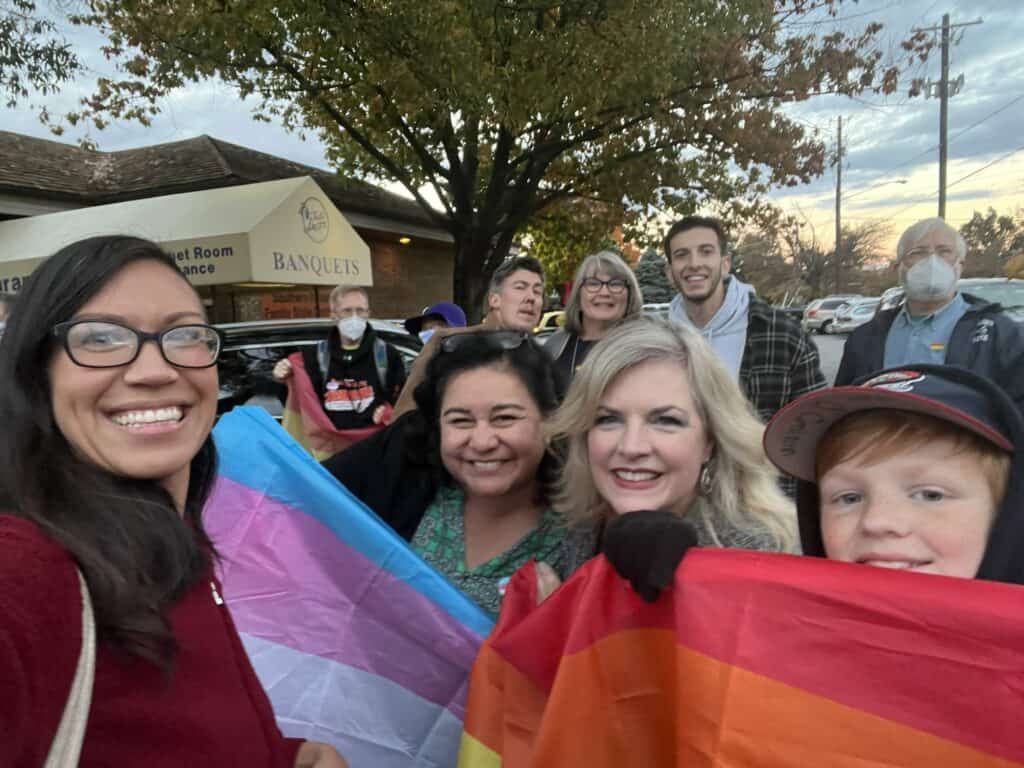 This is a photograph of Montgomery County Councilwoman, a candidate for the County Council at the time, protesting That’s Amore Grill in Rockville, Maryland. 