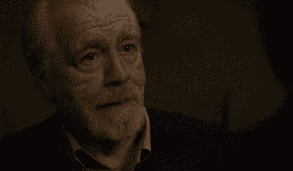 This is a picture of Logan Roy, played by Brian Cox, talking to U.S. Senator Evis, at Shiv Roy's wedding. 