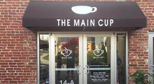 This is an outside photograph of The Main Cup in Middletown, Maryland. 