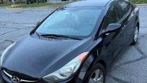 This is a photograph of Ryan Miner's 2012 Hyundai Elantra with 268,444 miles. He once drove Dan Bongino in this car.